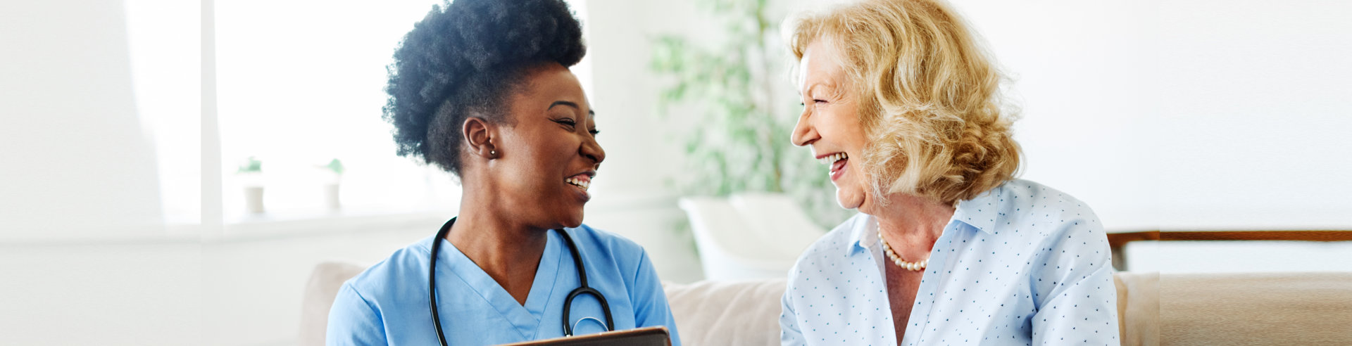 two woman smiling